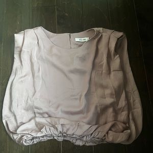 a lavender sleeveless top! never worn! it’s darker in person than in the photos.